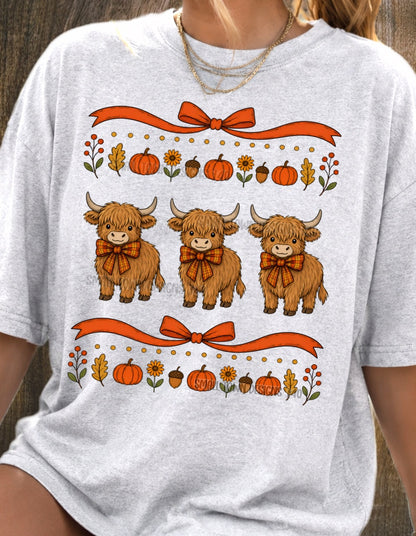 Fall highland cows